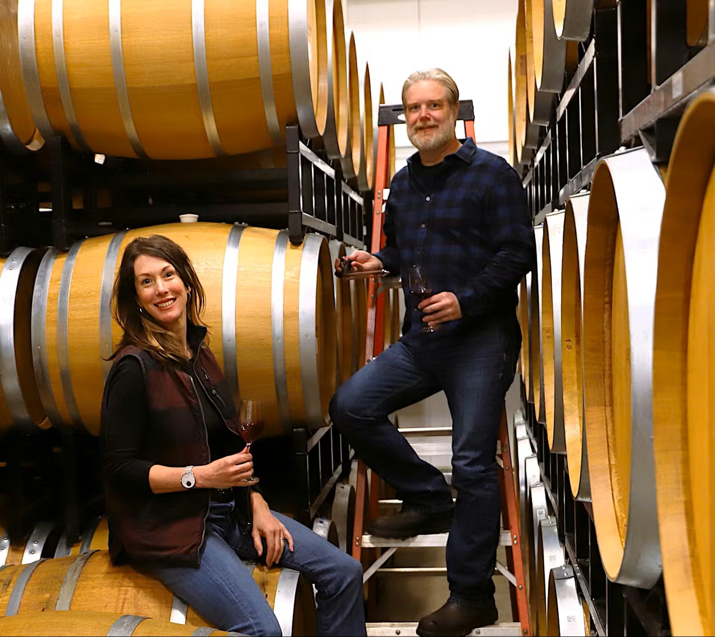 winemakers in the barrel room